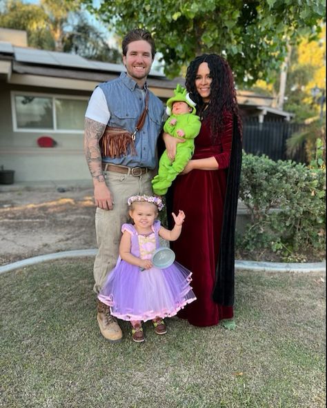 Flynn Rider, Pascal, Mother Gothel & Rapunzel! Rapunzel Mother Gothel Costume, Rapunzel Family Costume Tangled, Family Rapunzel Halloween Costumes, Family Princess Costumes, Mother Gothel And Rapunzel Costume, Tangled Costume Family, Family Tangled Costumes, Big And Little Sister Halloween Costumes, Diy Flynn Rider Costume