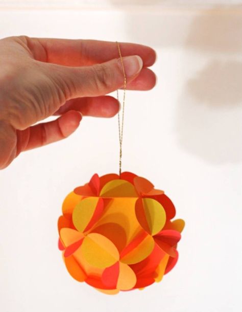 Add something special to your tree-trimming tradition with one of these DIY Christmas Ornaments! 🎄✨ DIY Christmas ornaments for every style. From minimal to modern, here are our favorite tree ornament tutorials to get you inspired. 🌟 #DIYOrnaments #HandmadeHolidays #ChristmasCrafts 3d Paper Ornaments, Paper Ornaments Diy, Diy Christmas Ball, Paper Ball, Diy Christmas Ornaments Easy, Paper Christmas Ornaments, Diy Christmas Ornament, Paper Balls, Navidad Diy