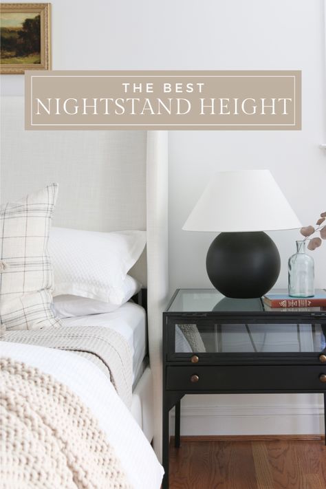 white upholstered bed with black nightstand, bedside lamp and decor Nightstand Height To Bed Guide, Nightstand Styling Bedside Tables, Different Nightstands On Each Side, Nightstand Styling Ideas, Nightstands Ideas Bedside Tables, Nightstand Height, Bedside Table Decor Ideas, Style Bedside Table, Nightstand Styling