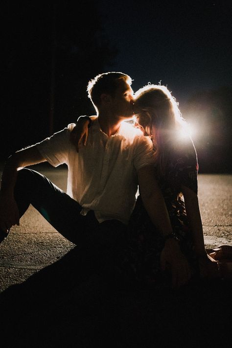 fun and intimate in the headlights at night engagement photos www.alyssabarletter.com #nightphotographytutorial #streetphotography #longexposurephotography #nightskyphotography #nightphotographysettings Secret Couple Poses, Headlights At Night, Private But Not A Secret, Secret Couple, Engagement Photography Tips, Night Engagement Photos, Night Engagement, Night Couple, Couple Photoshoot Poses