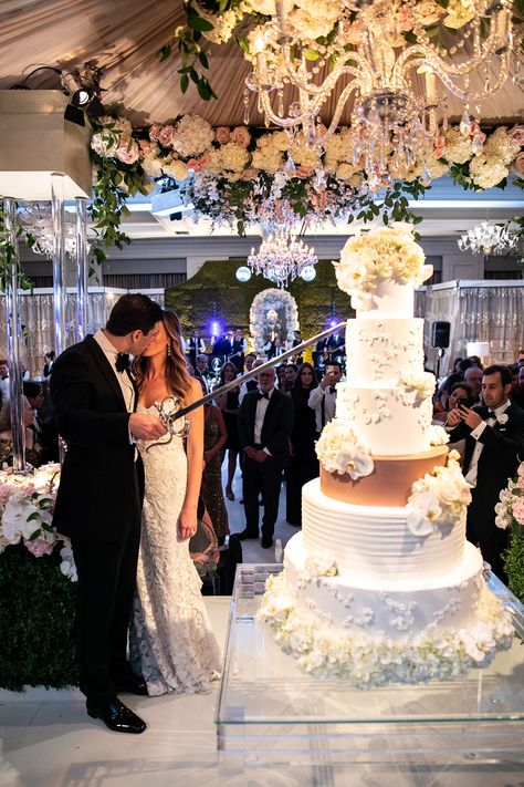 Amanda surprised Bennett with this monogrammed sword as a nod to rapper Gucci Mane, who also cut his wedding cake with a sword. “It was supposed to be a joke, but then he wouldn’t put it down!” Amanda laughs.#DWeddings #DallasWeddings #SixTieredCake #GucciMane #ToddEvents #FancyCakes Garden Themed Wedding Dress, Untraditional Wedding Cakes, Bridal Photo Ideas, Armenian Wedding, Moodboard Wedding, Lebanese Wedding, Wedding Dress Veil, Emperor's New Groove, Forest Theme Wedding