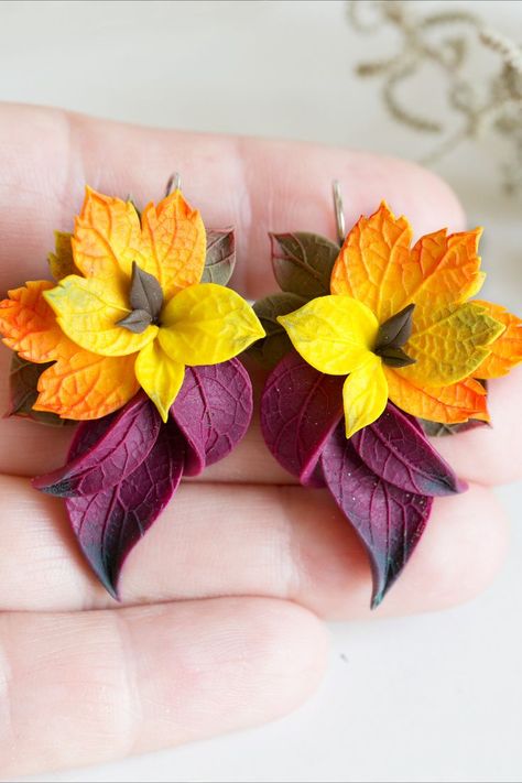 Polymer clay artisan earrings with red and yellow maple leaves Fall Leaf Clay Earrings, Polymer Clay Holiday Earrings, Autumn Polymer Clay Earrings, Fall Polymer Clay Ideas, Autumn Polymer Clay, Fall Polymer Clay Earrings, Polymer Clay Art Jewelry, Clay Art Jewelry, Autumn Earrings