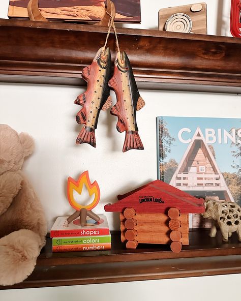 A year ago today, we found out about our newest roommate. Felt appropriate to finally get around to sharing pictures of his room 🏕️🎣🌞🪵👶🏻 Nursery reveal, baby room inspiration, summer camp theme room, retro cabin interior design, boy’s room, outdoorsy design, kid’s room Hiking Themed Room, Camp Themed Playroom, Camping Nursery Theme Gender Neutral, Vintage Camping Nursery, Happy Camper Nursery Theme, Vintage Camp Nursery, Camping Nursery Theme Boys, Cabin Themed Nursery, Nursery Camping Theme