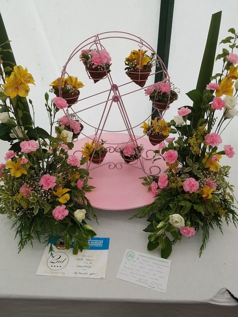 2nd place at the Gower show.ferris wheel and parallels Flower Ferris Wheel, Ferris Wheel Decor, Fair Theme, Seed Art, Fair Rides, Wheel Decor, Carnival Rides, Fun Fair, 2nd Place