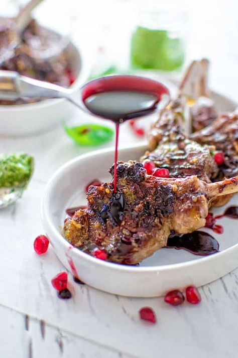 LAMB CHOPS WITH PESTO AND POMEGRANATE SAUCE Pomegranate Sauce Recipe, Mabon Meal, Fancy Entrees, Pomegranate Lamb, Pomegranate Sauce, Roasted Pepper Sauce, Pomegranate Recipes, Grilled Lamb Chops, Fruit Sauce