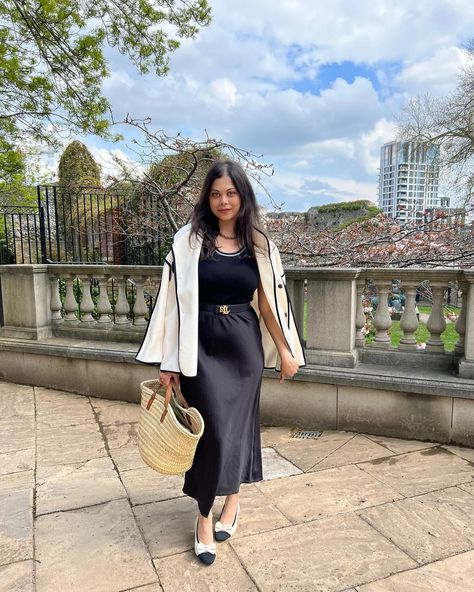 If I ever let my head down, I’m just admiring my shoes 🖤🤍 Love my @vivaia_official running heels so much! (Pr product) Outfit details: Black Satin skirt - @mango Top @chicwish Jacket - @stylewe Belt - @ralphlauren Basket bag - @bohemiadesign #stylewe #springoutfits #springootd #basketbags #vivaiaonmyway #vivaiashoes #vivaia #colourmeinstyle #blackandwhiteoutfit #blacksatinskirt #satinskirt #neutraloutfit #neutraloutfits #neutraloutfitinspo #neutraloutfitsdaily Black Satin Skirt, Ootd Spring, Mango Tops, My Shoes, Neutral Outfit, Basket Bag, Satin Skirt, Outfit Details, Black Satin