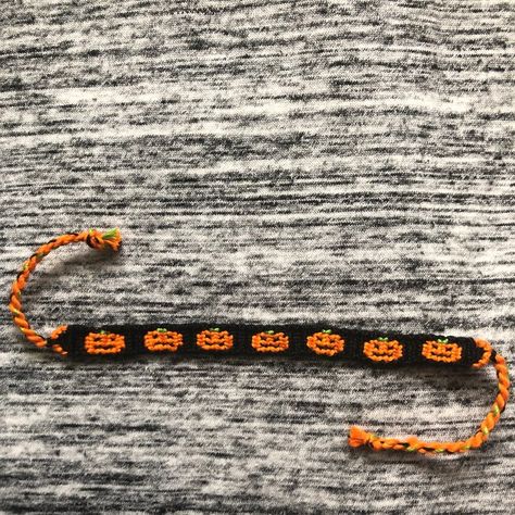 Alpha Pattern #16185 | BraceletBook.com Halloween String Bracelet, Halloween Thread Bracelet, Horror Bracelet Patterns, Halloween Bracelet Patterns, Crochet Alpha Pattern Halloween, Gsa Ideas, Fall Alpha Bracelet, Halloween Bracelet Patterns Alpha, Bracelet Book Patterns