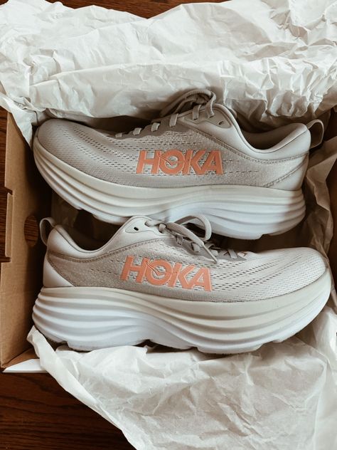 Brand new gray and orange Hoka running shoes in the box, ready to hit the track and enhance your running experience. Hoka Rincon 3, Hoka Running, Hoka One One Woman, Orange Details, Cheap Sneakers, Womens Running, Gray Design, Road Running, Athletic Sneakers