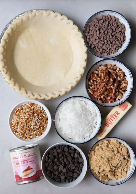 I Tried “Texas Trash Pie” and It’s the Easiest Last-Minute Dessert | The Kitchn Texas Trash Pie Recipe, Texas Trash Pie, Trash Pie, Texas Trash, Pie Crust From Scratch, Frozen Pie Crust, Frozen Pie, Crumble Recipe, Pecan Recipes