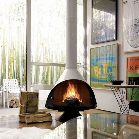 The Best Electric Fireplace for You | Architectural Digest Midcentury Fireplaces, Scandinavian Fireplace, Mid Century Modern Fireplace, Malm Fireplace, Modern Wood Burning Stoves, Hanging Fireplace, Freestanding Fireplace, Traditional Fireplace, Modern Fireplace