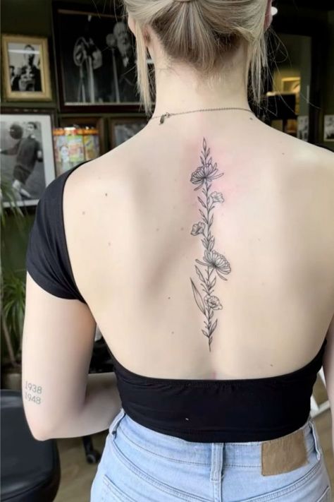 Floral spine tattoo small, flower spine tattoo, Floral spine tattoo female, birth flower spine tattoo, Floral spine tattoo meaning, simple flower spine tattoo, Floral spine tattoo ideas, delicate flower spine tattoo Lily Of The Valley Back Tattoo, Poppy Back Tattoo, Floral Spine Tattoo, Back Tattoo Women Spine, 2026 Wedding, Floral Back Tattoos, Flower Spine Tattoos, Idea Tattoo, Lavender Tattoo