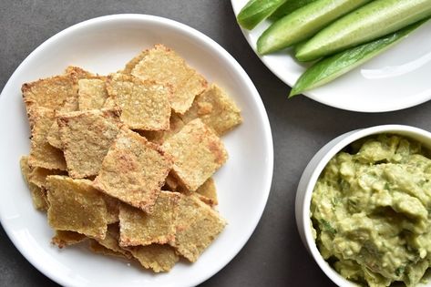 Made with just six ingredients (and ready in 20 minutes), these healthy cauliflower crackers offer a low-carb alternative to overly processed snack foods. Cauliflower Crackers, Crispy Crackers, Crackers Recipe, Carb Alternatives, Guilt Free Snacks, Cassava Flour, Snack Foods, Appetizer Bites, Cracker Recipes