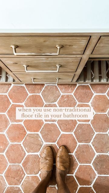 Becky George | House + Home on Instagram: "WHY I CHOSE TERRACOTTA for my bathroom flooring:

✨we used pure 6x6 terracotta hex tiles and put a clear sealant on top for protection—this selection was a huge risk—most people use it for outdoor spaces, but in my mind, why not for a bathroom?! I’m so glad I chose it because it’s unique for this space and people always ask us about it!

✨I knew I wanted something different, long lasting and timeless. terracotta tiles are unique, beautiful (with natural color striations), durable, and super easy to maintain (with a proper seal to protect from any staining). 

we are over a year since install, and NO REGRETS!! would you try this?! happy to answer any questions you might have!

#bathroomdesign #bathroomtile #terracotta #homedecor #homeinspo #lovewhe Bathrooms With Terracotta Floors, Terracotta Floor Tiles Bathroom, Bathroom With Terracotta Floor Tiles, Bathroom Floor Tiles Design Ideas, Terracotta Bathroom Ideas, Terracotta Bathroom Tiles, Terracotta Tile Bathroom, Terracotta Tiles Bathroom, Terracotta Bathroom