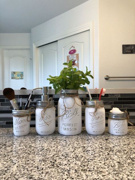 Cheap and easy storage ideas for your farmhouse home decor. Easy storage DIY ideas for your kitchen, living room, bedroom, laundry room and bathroom decor on a budget. #hometalk Laundry Room Decor Diy, Aging Terra Cotta Pots, Cotton Ball Holder, Distressed Mason Jars, Recycled Jars, Diy Jar Crafts, Mason Jar Crafts Diy, Jar Diy, Painted Mason Jars