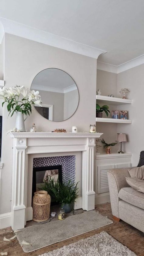 White Living Room Fireplace, White Log Burner Fireplace, Fireplace Circular Mirror, Fire Surround Ideas, White Fire Surround, 1930s Fire Surround, Marble Fire Surround With Log Burner, Marble Fire Surround, Fire Surrounds