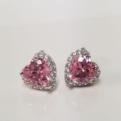 "Thanks for shopping our vintage estate store. We tend to sell well below wholesale and truly hope you enjoy all of our items. Many of the items are one of a kind, so please enjoy scrolling through the pictures and hopefully something will catch your eye. Black spots are from camera. Nice estate sterling silver 925 Pink Heart 1ct Pink Ice and Cz Diamond studs. Size: 3/8\" 9mm Weight: 2.45 grams Heart gem: .50ct each stud Makes a great present. This is a custom made earrings from our shop, meanin Pink Heart Earrings Aesthetic, Pink Diamond Earrings, Nice Earrings, Heart Gem, Pink Heart Earrings, White Gold Earrings Studs, Sapphire Studs, Pink Gem, Heart Stud Earrings