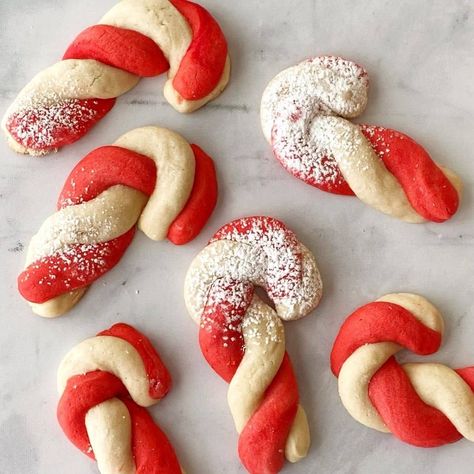 These festive almond candy cane cookies are a family favorite. With their tender, buttery texture, these will be the star of any holiday cookie swap, Candy Cane Pinwheel Cookies, Candy Cane Cookies With Almond Extract, Almond Candy Cane Cookies, Candy Cane Christmas Cookies, Christmas Candy Cane Cookies, Candy Cane Cookie Recipe, Candy Cane Cookie, Almond Candy, Almond Sugar Cookies