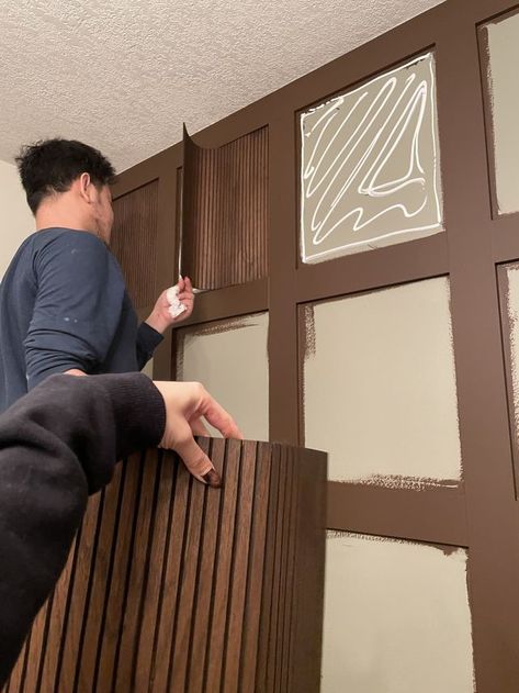 Reeded Wall Paneling, Bathroom Wallpaper Brown Cabinets, Dark Brown Wainscoting, Stained Pole Wrap, Wood Beadboard Walls, Pole Wrap Kitchen Cabinet, Stained Beadboard Walls, Wood Wall Paneling Ideas, Brown Beadboard