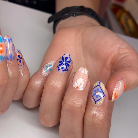 Channeling the vibrant spirit of Mexican pottery with these intricate nail designs. Each pattern tells a story, bringing a touch of culture and artistry to your fingertips. 🌸✨ #MexicanPottery #NailArt #HandPaintedNails #CulturalBeauty #NailInspo #ArtisticNails #BrightAndBold #NailDesign #NailTech #ColorfulNails @lianakorber Mexican Nail Art Mexico, Barro Nails Mexican, Mexican Tile Nails, Mexico Inspired Nails, Mexican Style Nails, Intricate Nail Designs, Mexican Nails, Aqua Nails, Mexican Tile