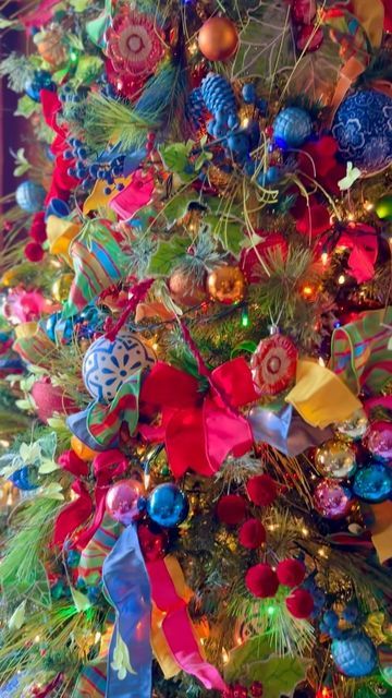 Courtney Wafzig on Instagram: "This is what a Christmas tree looks like when you cannot put another ornament, ribbon or light on it. Who else has a tree like this? LOL" Carnival Christmas Tree, Jewel Toned Christmas Tree, Non Traditional Christmas Tree, Eclectic Christmas, Colored Christmas Lights, Glam Christmas Tree, Christmas Tree Decorations Ribbon, Ornament Ribbon, Amazing Christmas Trees