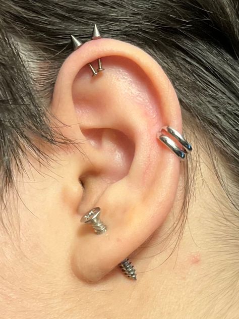 #earpiercings #piercings #piercinginspo Double Lobe Jewelry, Cat Flap Piercing, Ear Piercings Punk, Goth Ear Piercings, Emo Ear Piercing Ideas, Ampallang Piercing, Alt Ear Piercings Aesthetic, Double Helix Piercings, Ear Piercing Helix