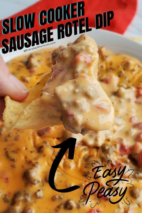 Slow cooker sausage rotel dip on a chip. Sausage Rotel Dip Crock Pots, Rotel Sausage Dip Crockpot, Rotel Dip Crockpot, Sausage Rotel Dip, Rotel Dip With Sausage, Cheesy Sausage Dip, Sausage Slow Cooker, Dip Recipes Crockpot, Slow Cooker Sausage