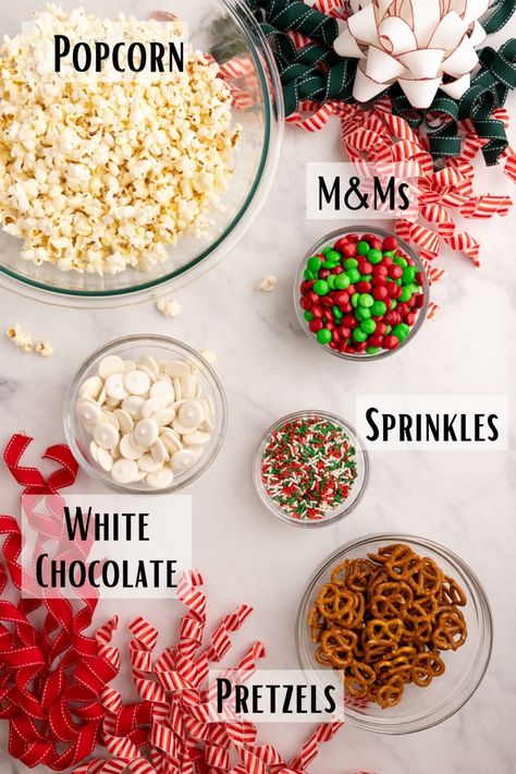 This Christmas popcorn recipe, also knowns as Christmas crunch, is perfect for parties, gifting, movie nights, or as a special snack to celebrate the holiday season! Caramel Popcorn Christmas Gift, Movie Night Snacks Christmas, Santa Crunch Popcorn, Popcorn Holiday Snack, Christmas Treats Bulk, Christmas Popcorn Snack Mix Recipes, Holiday Popcorn Gift Ideas, Popcorn Neighbor Christmas Gifts, Quick Christmas Treats For Gifts