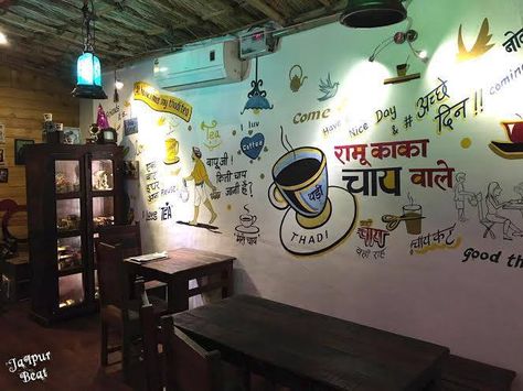 Monsoon always calls for chai, whether it is from a tea stall or a fancy cafe!  #monsoon #tea #jaipurbeat #cafe Chai Cafe Interior Design, Chai Shop Interior, Chai Cafe Design, Chai Tapri Design, Indian Tea Shop Interior, Tea Stall Ideas, Tea Restaurant Design, Chai Cafe Interior, Indian Cafe Interior Design