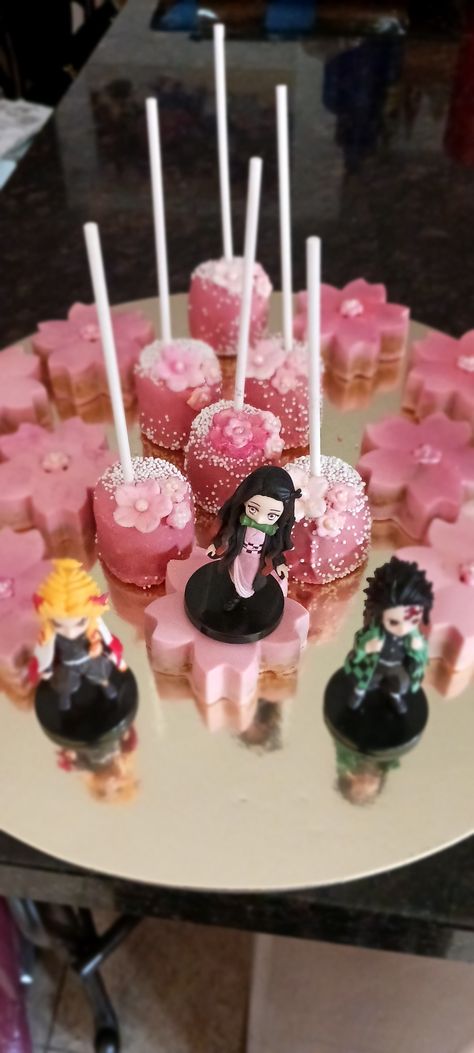 Demon Slayer cake pops and cake pucks-Cherry blossoms. Demon Slayer Wedding Theme, Demon Slayer Wedding, Demon Slayer Cake, Cake Pucks, Anime Food, Cake Pop, Cherry Blossoms, Wedding Theme, Cake Pops