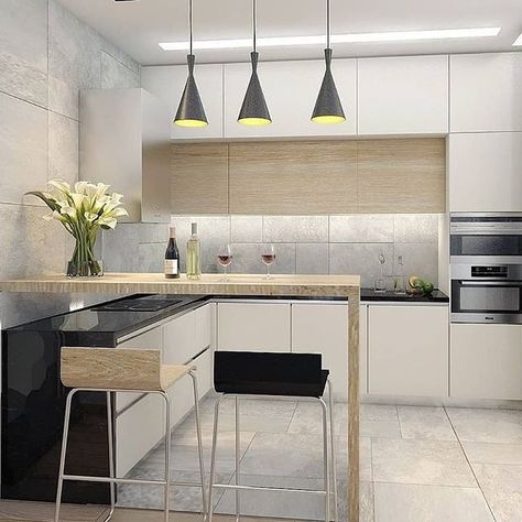 Another small kitchen with breakfast counter and three hanging lights.  #interiordesign #designinterior #cabinets #Kitchendesign #kitchendecor #kitchendesignideas #kitchenette #wood #homedecor #decor #Delhi #DelhiModularWardrobes #gurgaon #pantry Kitchen With Breakfast Counter, Small Kitchen Bar, Small Kitchen Lighting, Breakfast Counter, Kitchen Bar Counter, Kitchen Bar Design, Hanging Lights Kitchen, Kitchen Modular, Hanging Lighting