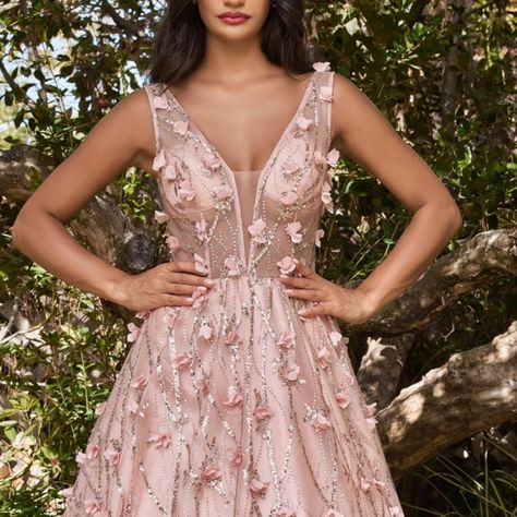 A Regal Royal Ball Gown Designed With The Bold In Mind. This Bright Layered Dress Is Embellished With Three Dimensional Flowers And A Glitter Pattern Cascading From Bodice To Hem. The Neckline Is A Deep Plunging V And An Open Back Held Up By Sleeveless Straps. Color Rose Gold Rose Gold Wedding Dress Simple, Rose Gold Wedding Dress Plus Size, Dusty Pink Wedding Dress, Royal Ball Gown, Glitter Ball Gown, Rose Gold Wedding Dress, Fitted Wedding Gown, Pink Wedding Gowns, Dusty Pink Weddings