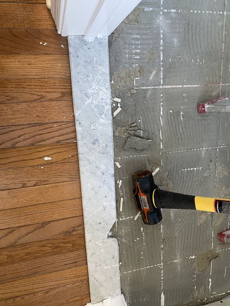 Installing a Marble Threshold - All About The House Door Threshold Ideas Interior, Marble Door Threshold, Marble Transition Strip, Bathroom Threshold Ideas, Bathroom Threshold Transition, Marble Threshold Transition, Marble Shower Threshold, Door Threshold Ideas, Bathroom Threshold