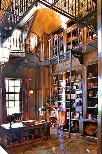 Two Story Library  This was another "what if" moment... When this sunken library was in construction, I looked up and said "What if we did a catwalk around the room?"... This is the result- a rich wood-paneled two story library with a reading niche on the second level. The stained and scored concrete features a sharp navigational star design in the middle...    -Design by Champagne Chic Interiors House Library, Glass Houses, Library Ladder, Dream Library, Beautiful Library, Library Room, Old Library, Bedrooms Ideas, Hobbit House