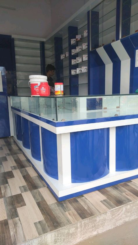 Mobile Shop Counter Design Modern, Kirana Store Design Counter, Counter Design Shop Retail Stores, Mobile Shop Counter Design, Mobile Shop Counter, Tiger Furniture, Office Counter Design, Dhoom 2, Mobile Shop Design