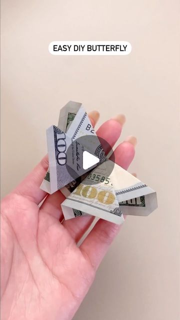 Valentina Balance on Instagram: "Quick #origami butterfly #giftideas #diy" Dollar Bill Butterfly How To Make, Butterfly Money Lei Diy How To Make, How To Make Butterflies Out Of Money, Money Folding Butterfly, How To Make Butterfly With Money, Gum Wrapper Origami Butterfly, How To Make A Butterfly Out Of Money, Money Origami Tutorial Step By Step, Money Origami Diy