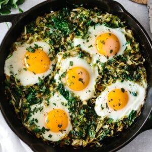 Mediterranean Vegetarian Recipes, Wildfit Recipes, Downshiftology Recipes, Green Shakshuka, Mediterranean Vegetarian, Sweet Potato Breakfast Hash, Shakshuka Recipe, Crispy Baked Chicken Thighs, Shaved Brussel Sprouts