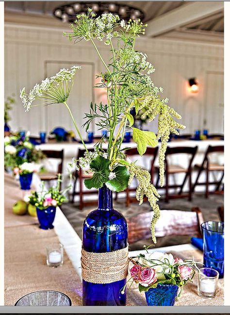 Table / Blue Bottle Cobalt Blue Wedding Centerpieces, Blue Bottle Wedding Decor, Cobalt Blue Vase With Flowers, Cobalt Blue Centerpieces, Blue Wine Bottle Centerpieces, French Flower Bucket, Cobalt Blue Weddings, Blue Wine Bottles, A Country Wedding