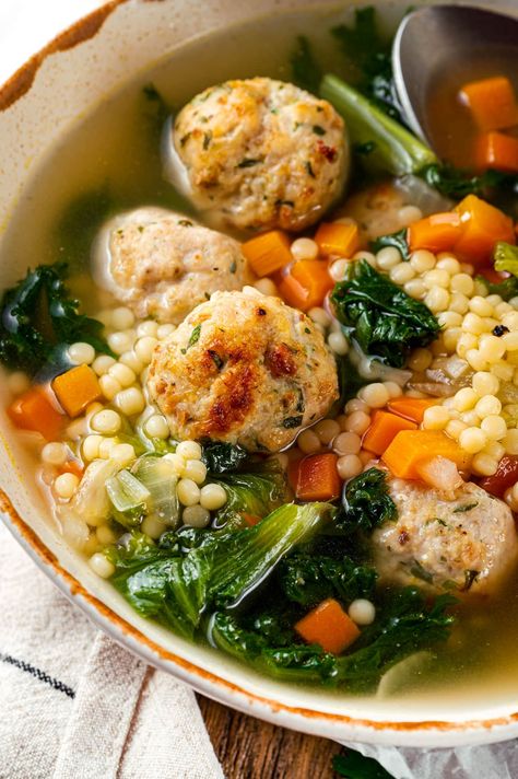 Made with homemade turkey meatballs, tiny pasta, and dark leafy greens, Italian Wedding Soup is simple yet flavorful. Ready in just 30 minutes! #soup #weightwatchers #groundturkey #dinner Homemade Turkey Meatballs, Escarole Soup, Tiny Pasta, Italian Wedding Soup Recipe, Wedding Soup, Dark Leafy Greens, Low Carb Pasta, Small Pasta, Easy Italian