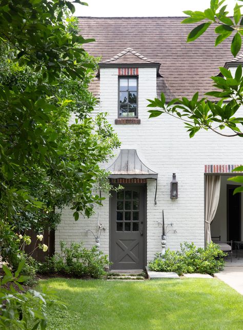 A Tudor-Revival in Houston that Pays Homage to its History while adding Modern Charm | Rue Small Front Yards, Southern California Home, Increase Curb Appeal, Cement Pavers, Tudor Revival, Small Vegetable Gardens, Small Front Yard, European Farmhouse, Built In Bar