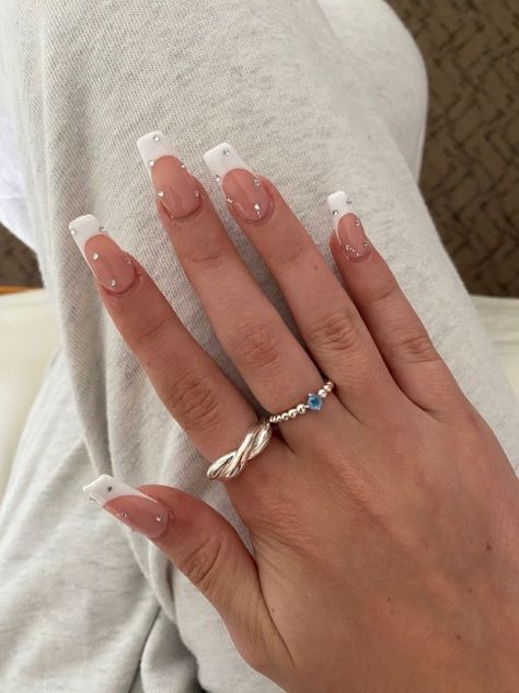 White Nails With Rhinestones French Tips, Square French Tip With Diamonds, White French Tip Nails With Crystals, White Decorated Nails, White French Tip W Pearls, Nail Inspo White Tip, White With Diamonds Acrylic Nails, White French Tip Nails Coffin With Gems, White French Tip Nails Coffin Design