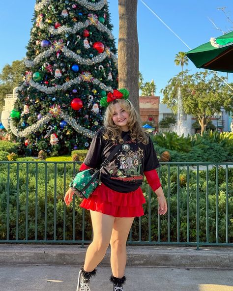 Santa Gertie’s coming to town 🦕🎅🏼🎄 There’s nothing like a Hollywood Studios Christmas 🥹 The vibes are so much fun! Especially during Dapper Day when everyone dresses up (which is coming up)! Swipe through to see the lil matching Santa Gertie pin I got gifted from @staymagicalco 🫶 and they sent me a tee to go with it! 🥰 Dinosaurs + Christmas is always such a vibe!! I’m actually really looking forward to visiting Animal Kingdom next and having one last Dinoland Christmas. 🥺 (rip) Which Di... Hollywood Studios Christmas, Christmas Disney Outfits, Hollywood Studios Outfit, Christmas Disney, Dapper Day, Christmas Feeling, Pin I, Dinosaur Christmas, Hollywood Studios