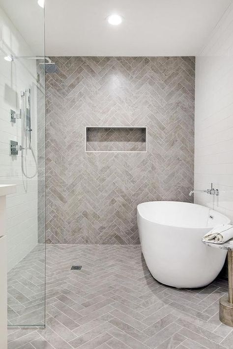 White Tile Bathroom Herringbone, Tile Shower Floor Ideas Walk In, Master Shower Accent Wall, Herringbone Shower Accent Wall, Bathroom With Herringbone Floor, Bathroom Shower Accent Wall, Herringbone Shower Niche, Modern Farmhouse Shower Tile, Bathroom Herringbone Tile Floor