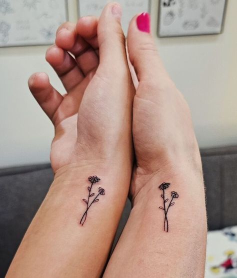 21 Small Meaningful Tattoos For Mother & Daughter Mother Daughter Behind The Ear Tattoo, Mother Daughter Tattoos For Mom, Cute Mother Daughter Tattoos Matching, Tattoo Ideas Female Dainty, Small Tattoo For Mom, She Gave Me Life Mother Daughter Tattoo, Matching Tattoos For Aunt And Niece, Tattoos For Mother Daughter, Mother Daughter Sister Tattoos