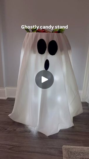 1.2K views · 233 reactions | DIY Halloween Ghost candy stand 👻🤍🖤

This cute and easy candy stand is perfect for leaving out on the porch for Halloween night, party or even at the office 🍬🍫🎃👻

What you need below 👇
-Round side table or stool 
-2 large plastic bowls for candy 
-White cloth/bed sheet 
-Black felt 
-light string (optional) outdoor/indoor safe 

place bowl on top of side table or stool, wrap string lights around legs of table, drape cloth over, cutout oval eyes and mouth for the ghost, then place bowl on top, place candy in bowl 👻🍬🍫
Happy Halloween 👻 🎃🧡
.
.
.
.
.
.
.
#halloween #halloweencandy #halloweenparty #halloweenpartyideas #diyhalloween #halloweendecor 

IB: @macy.blackwell | Home decor by Ro Halloween Candy Bowl On Porch, Diy Halloween Candy Bowl, Ghost Candy Bowl, Halloween Night Party, Diy Halloween Ghosts, Macy Blackwell, Cloth Bed, Halloween Candy Bowl, Easy Candy