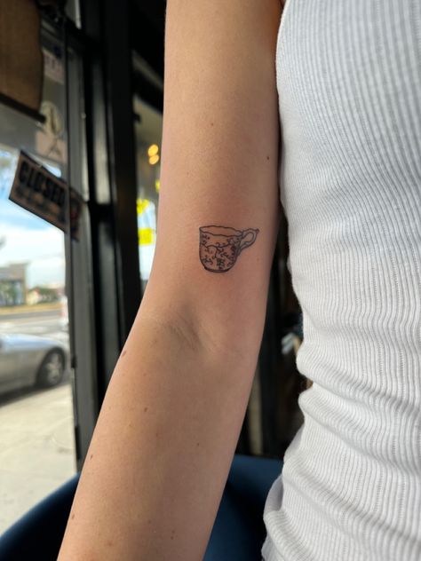 cute custom dainty tea cup tattoo #tattoo #teacup #teacuptattoo #daintytattoo #finelinetattoo Tea Cup Fine Line Tattoo, Cup And Saucer Tattoo, Tea Cup With Tea Bag Tattoo, Tiny Mug Tattoo, Simple Teacup Tattoo, Fine Line Teapot Tattoo, Cute Tea Tattoo, Matching Tea Cup Tattoo, Cup Overflowing Tattoo