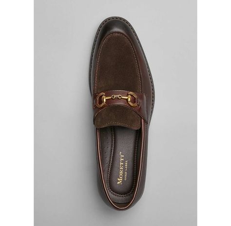 Moretti Dickens Bit Loafers, Dark Brown Leather Slip-On Shoes :9.5 D-Width * Elevate your style with the Moretti Dickens Bit Loafers in dark brown. These sleek leather slip-on loafers are designed for men who appreciate a blend of classic style and modern comfort. Perfect for formal occasions or business casual settings, these loafers offer a sophisticated look with the convenience of a slip-on design. * Premium dark brown leather with a stylish bit of detail * Slip-on design for easy wear ... Luxury Modern Brown Loafers, Luxury Brown Loafers For Semi-formal Occasions, Timeless Brown Semi-formal Loafers, Luxury Brown Masculine Loafers, Brown Slip-on Loafers With Metal Feet, Bit Loafers, Leather Slip On Shoes, Dark Brown Leather, Leather Slip Ons