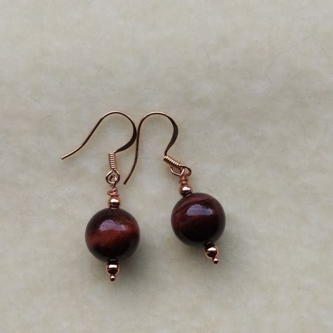 Red Tigers Eye With Good Chatoiency (How It Reflects Light). Copper Ear Wires And Beads. Unique. 1&1/4 Inch Long. Bead Is Reddish Brown In Color. Cjdesign Tiger Eye Earrings, Tiger Eye Jewelry, Light Copper, Red Tigers Eye, Eye Earrings, Reddish Brown, Tigers Eye, Tiger Eye, Ear Wires