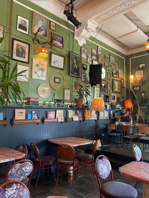 Cafe Porch Ideas, Maximalist Cafe Interior, Eclectic Cafe Interiors, Country Cafe Interior, Indie Coffee Shop Aesthetic, Vintage Coffee Shop Decor, Colorful Coffee Bar, Cottage Coffee Shop, Coffee Store Aesthetic