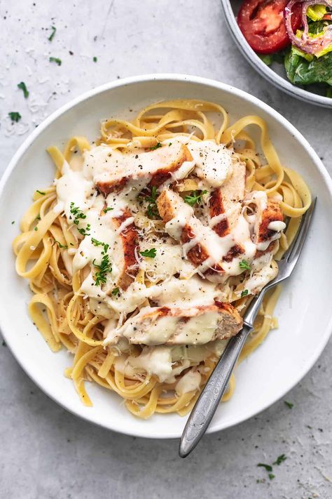 Olive Garden Chicken Alfredo is the most perfectly tasty copycat recipe. Creamy, rich, delicious alfredo sauce over moist, tender chicken breasts and fettuccini -- it doesn't get much better than this! Olive Garden Chicken Alfredo, Olive Garden Chicken Alfredo Recipe, Grilled Chicken Alfredo, Simple Chicken Alfredo Recipe, Panini Recipes Chicken, Olive Garden Chicken Gnocchi, Olive Garden Alfredo Sauce, Olive Garden Chicken, Braised Chicken Breast