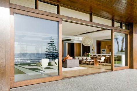 © Remco Jansen Honed Concrete, Timber Sliding Doors, Sliding Doors Exterior, Design Salon, Timber Door, Sliding Glass Doors, Sliding Patio Doors, Open Living Room, Patio Doors